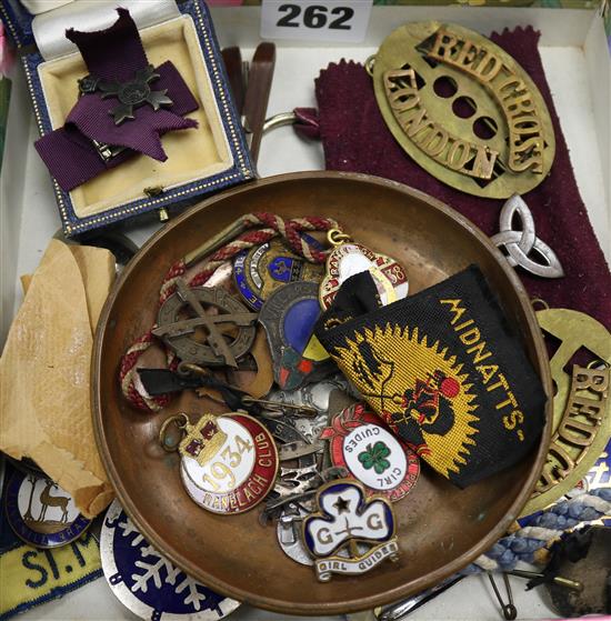 A quantity of old sporting badges etc